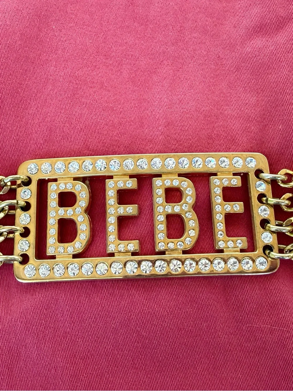 Vintage Y2K bebe Gold-Tone chain Logo Belt with rhinestone studs. One size